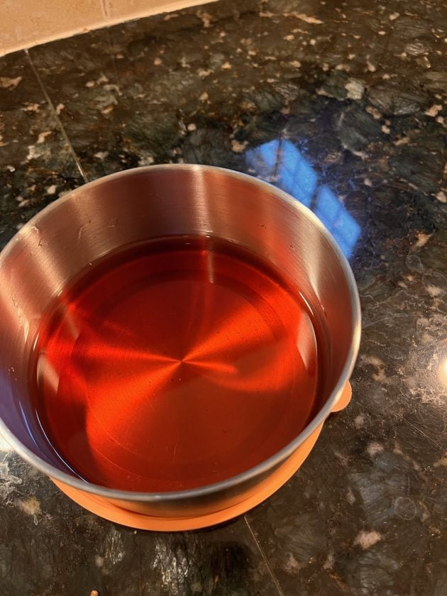 making syrup for fizzy strawberry drink